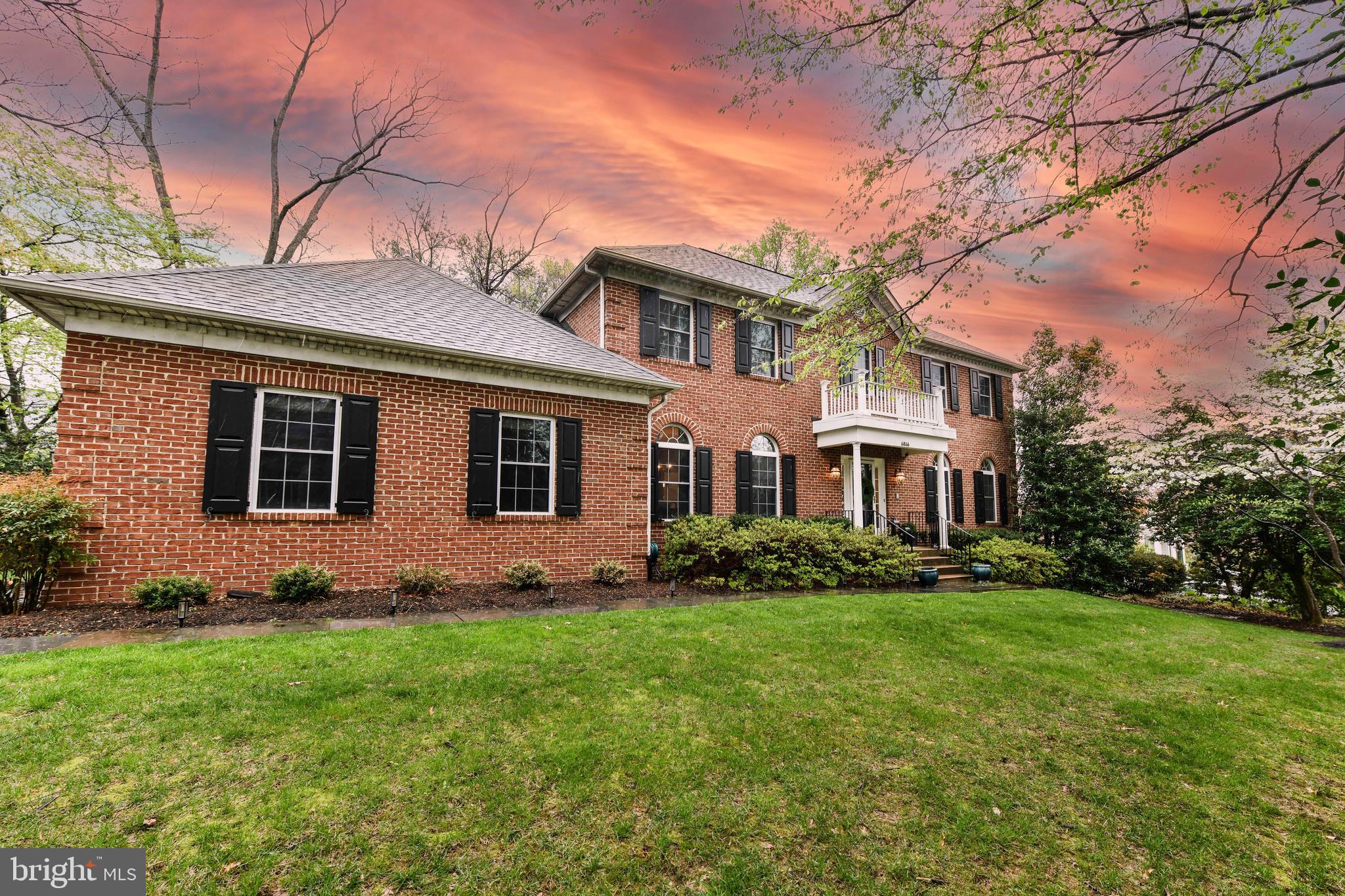 6866 Melrose Drive McLean, VA 22101 - Photo 1 of 42 a front view of house with yard and green space