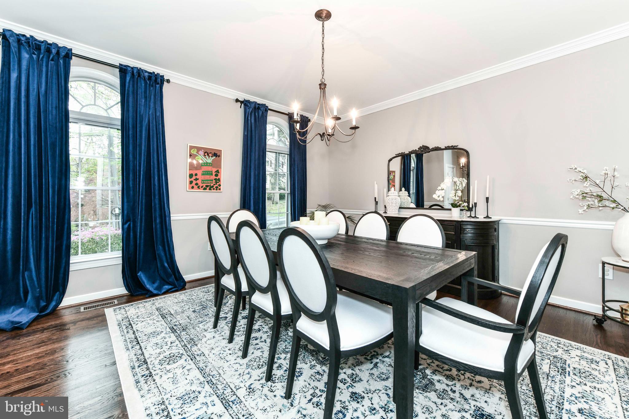 6866 Melrose Drive McLean, VA 22101 - Photo 11 of 42 a view of a a dining room with furniture window and wooden floor