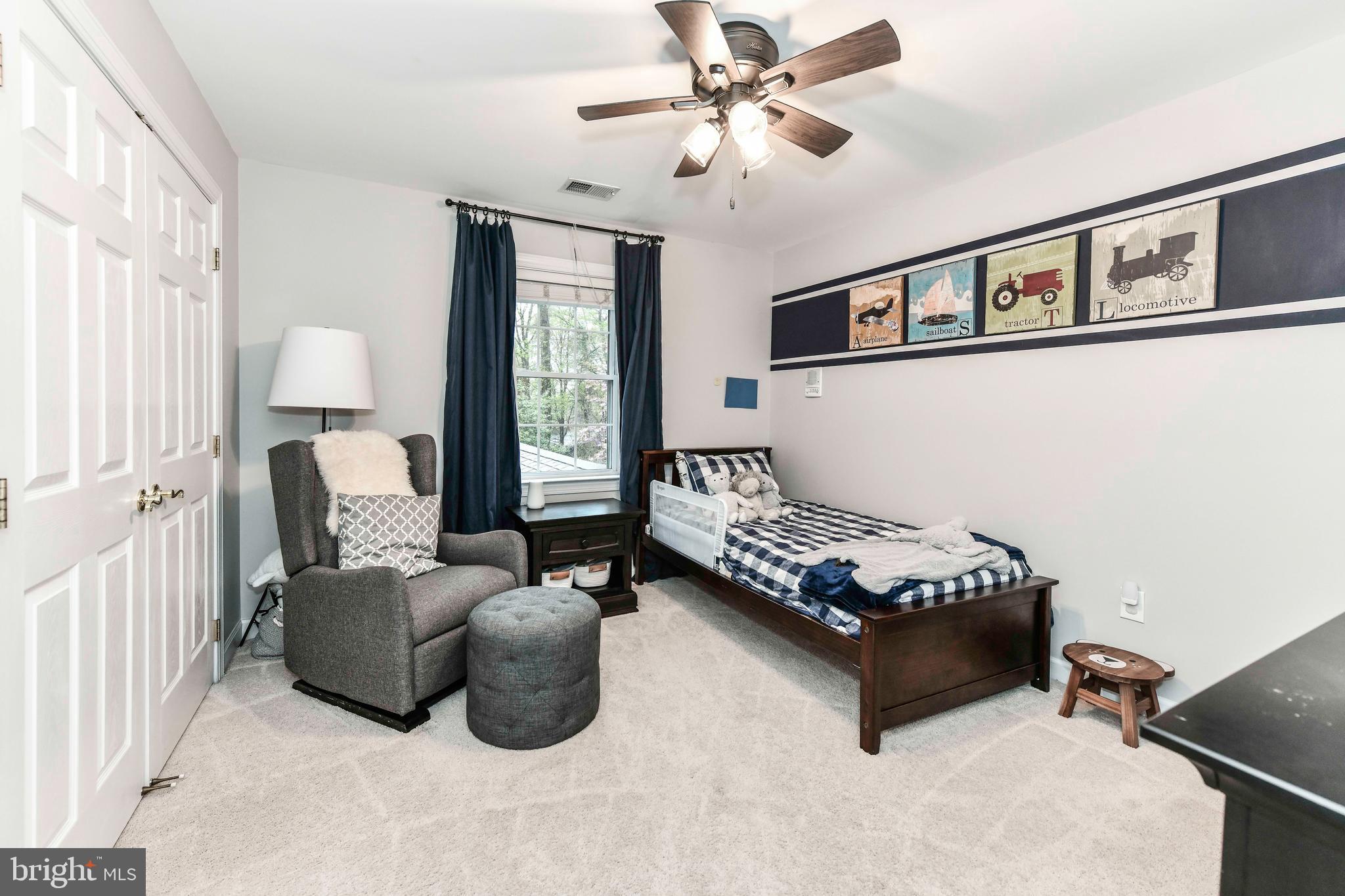 6866 Melrose Drive McLean, VA 22101 - Photo 25 of 42 a living room with furniture and a window