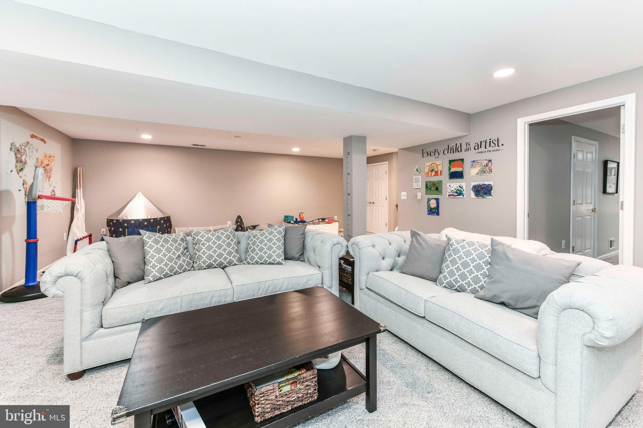 6866 Melrose Drive McLean, VA 22101 - Photo 31 of 42 a living room with furniture and a couch