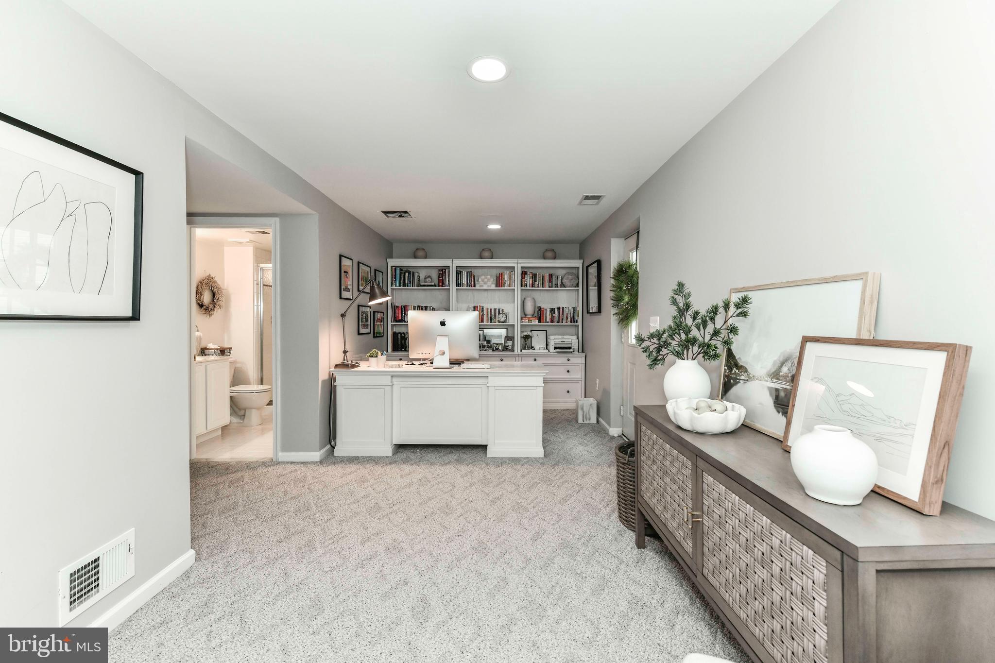 6866 Melrose Drive McLean, VA 22101 - Photo 32 of 42 a living room with furniture and wooden floor