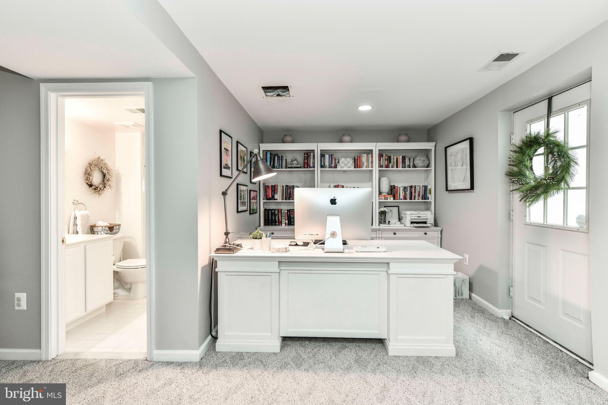 6866 Melrose Drive McLean, VA 22101 - Photo 33 of 42 a living room with stainless steel appliances granite countertop furniture and a window