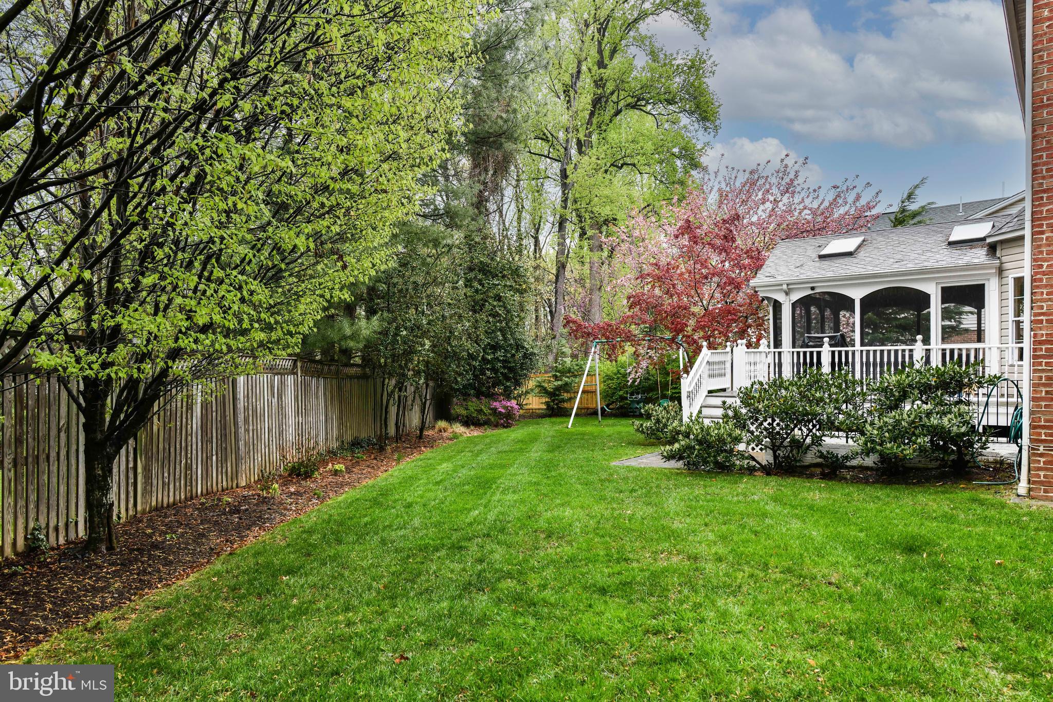 6866 Melrose Drive McLean, VA 22101 - Photo 36 of 42 a front view of a house with garden