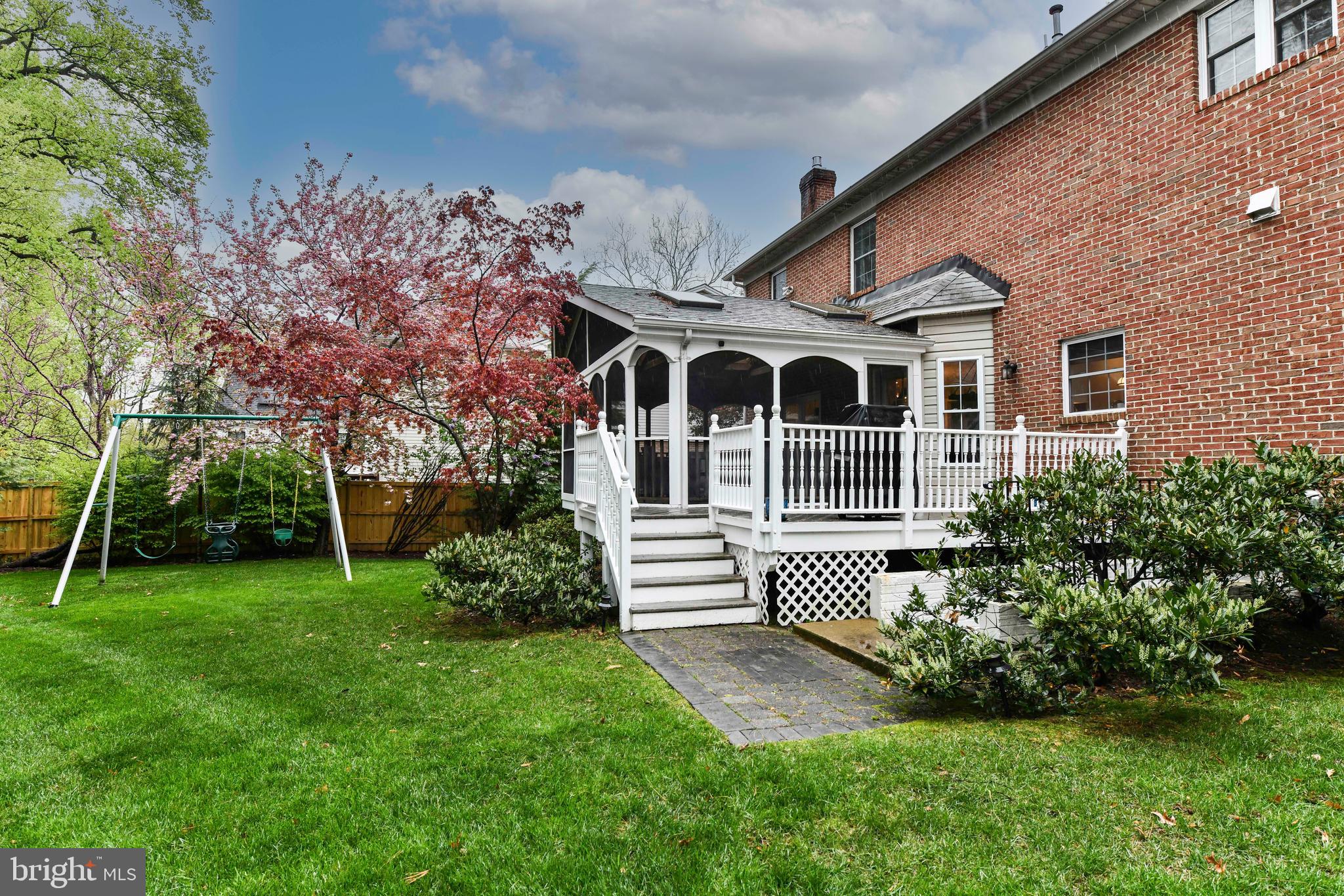 6866 Melrose Drive McLean, VA 22101 - Photo 37 of 42 a front view of a house with a garden