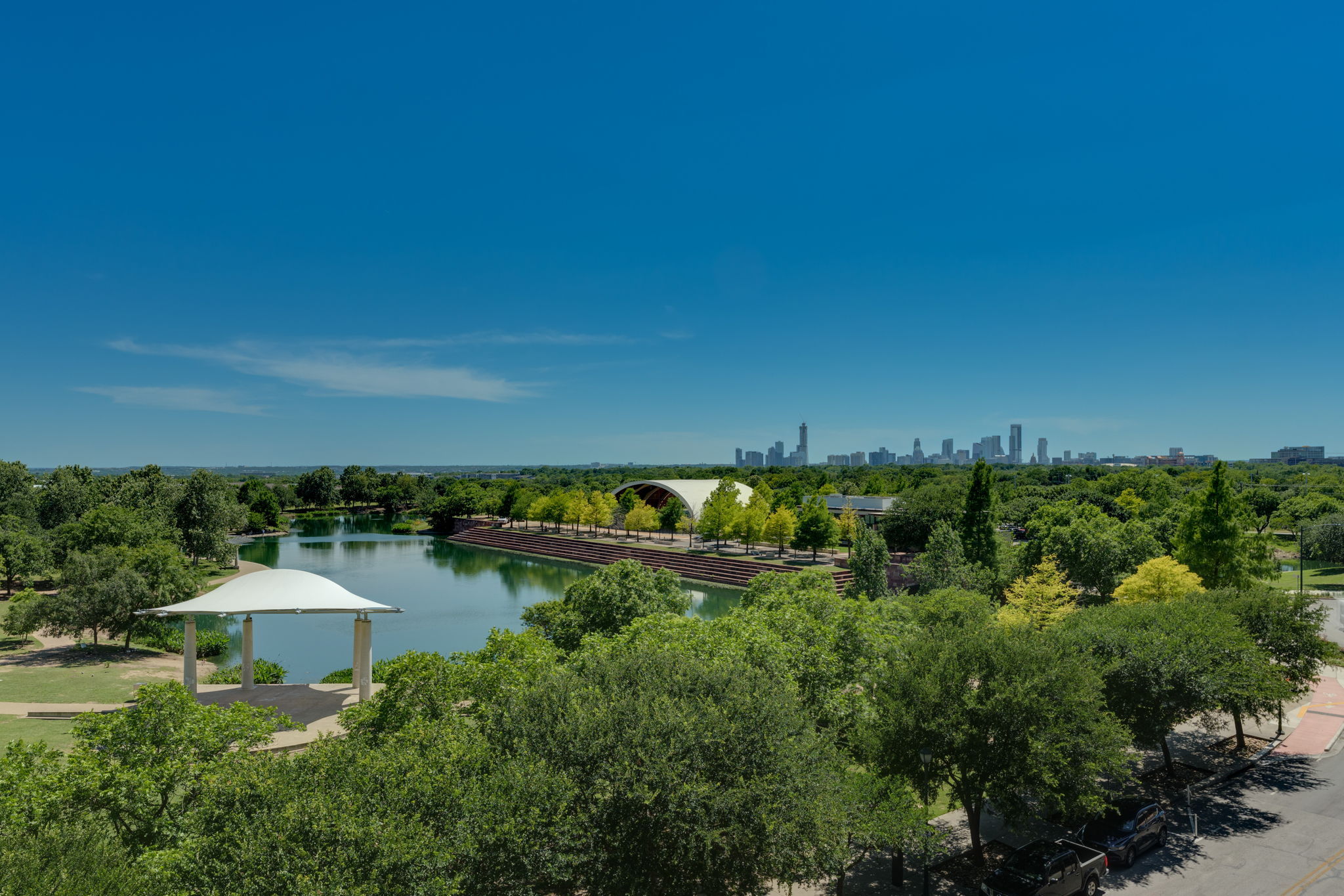 1701 Simond Avenue, Unit 524 Austin, TX 78723 - Photo 20 of 30 a view of a lake with houses in back
