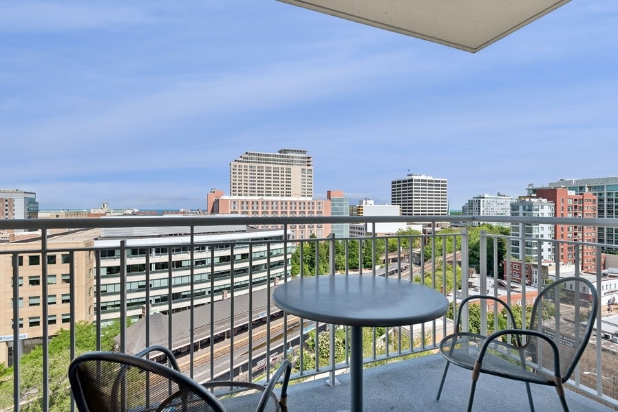 1640 Maple Avenue, Unit 1107 Evanston, IL 60201 - Photo 13 of 28 a view of a balcony with chairs