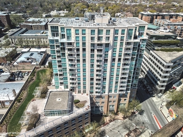 1640 Maple Avenue, Unit 1107 Evanston, IL 60201 - Photo 19 of 28 a view of a city with tall buildings