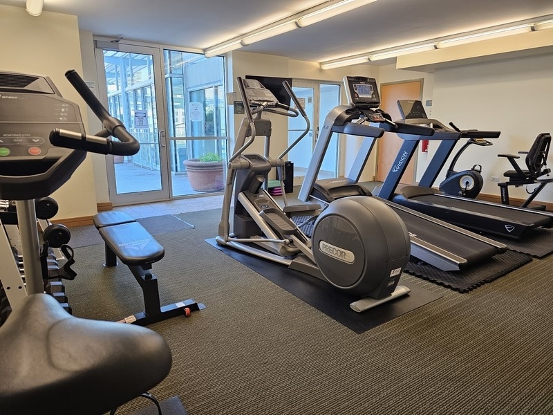 1640 Maple Avenue, Unit 1107 Evanston, IL 60201 - Photo 23 of 28 a view of a room with gym equipment
