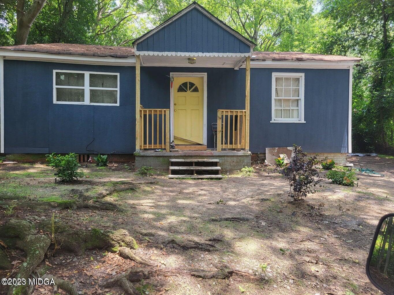 3098 Rice Circle Macon, GA 31204 - Photo 1 of 5 a front view of a house with garden