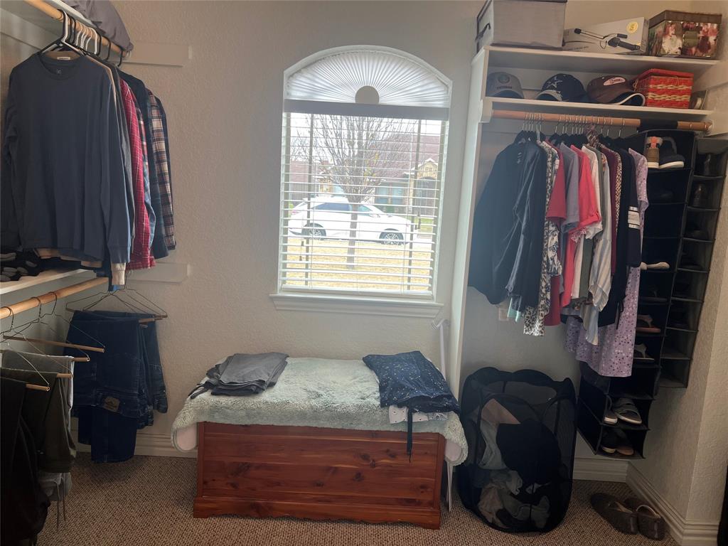 312 McAfee Street Mabank, TX 75147 - Photo 12 of 40 a bed room with a bed and a window