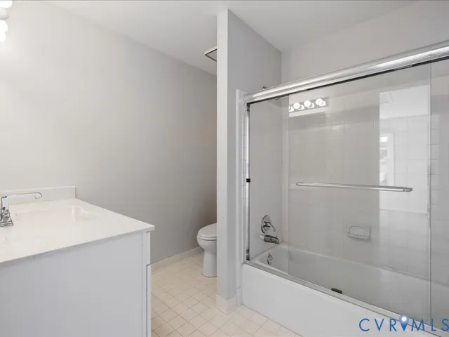 an empty room with a hallway