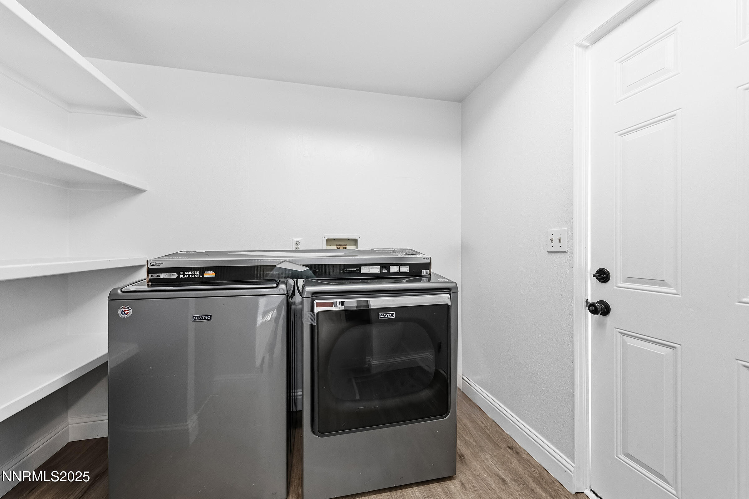 2650 Daffodil Way Reno, NV 89512 - Photo 16 of 22 a view of a storage and utility room with washer and dryer