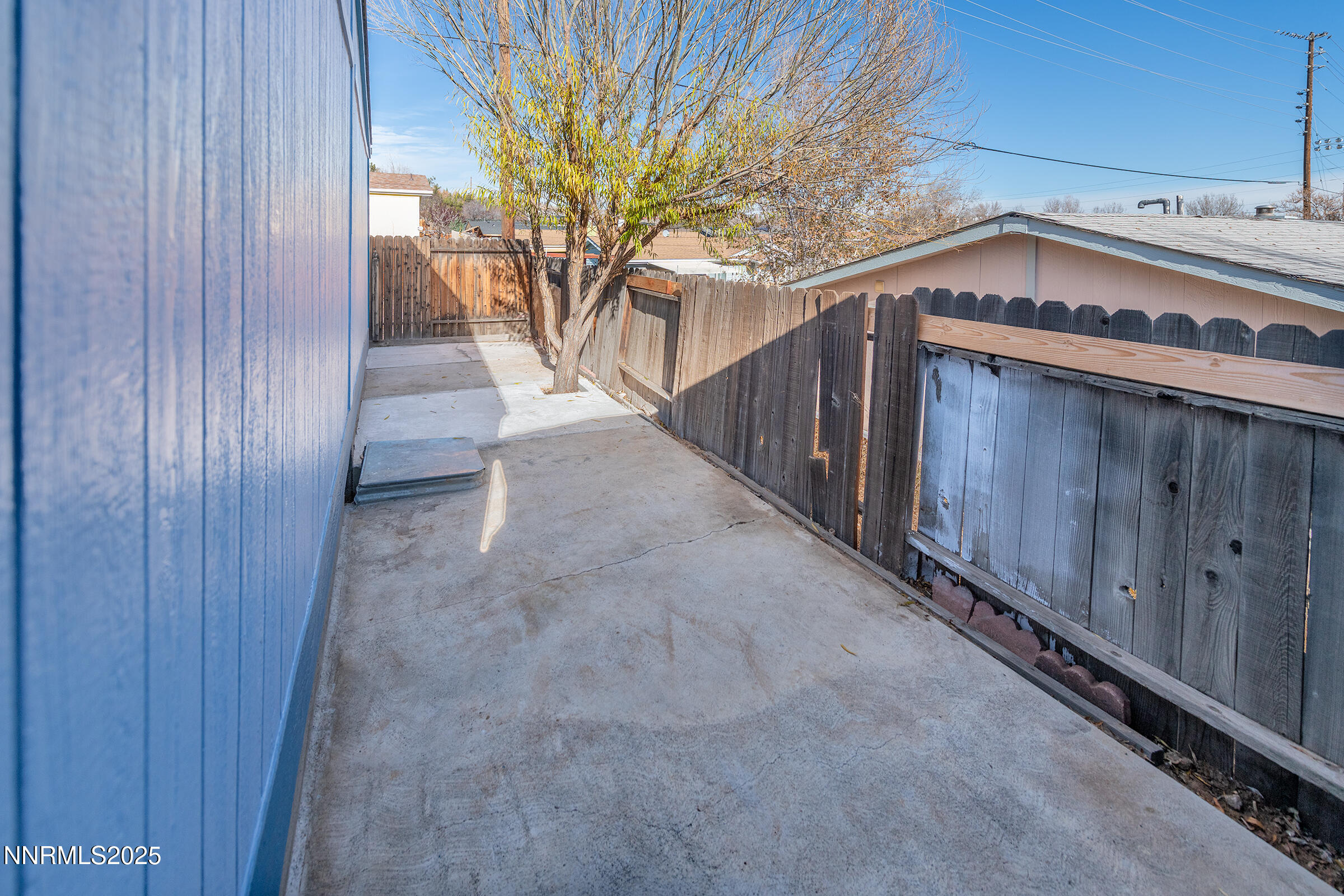 2650 Daffodil Way Reno, NV 89512 - Photo 17 of 22 a view of a pathway of a house and trees
