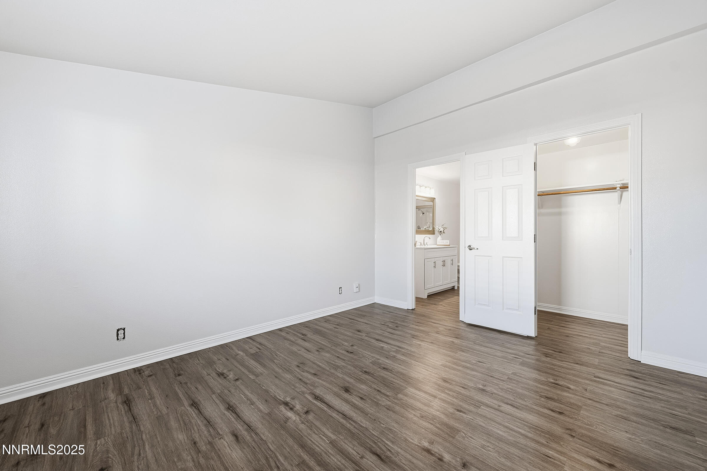 2650 Daffodil Way Reno, NV 89512 - Photo 5 of 22 a view of an empty room and wooden floor