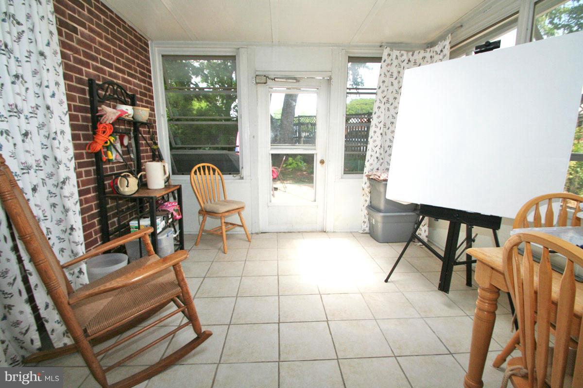 1420 Glendale Road Baltimore, MD 21239 - Photo 22 of 23 Interior Glass Enclosed Porch