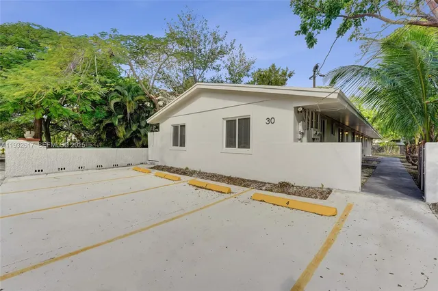 a bathroom with a shower and a toilet