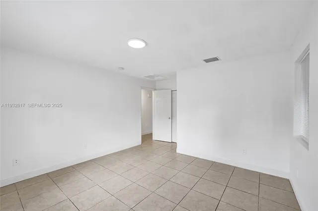a bathroom with a toilet a sink and bathtub
