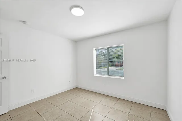 a kitchen with stainless steel appliances granite countertop a stove sink and cabinets