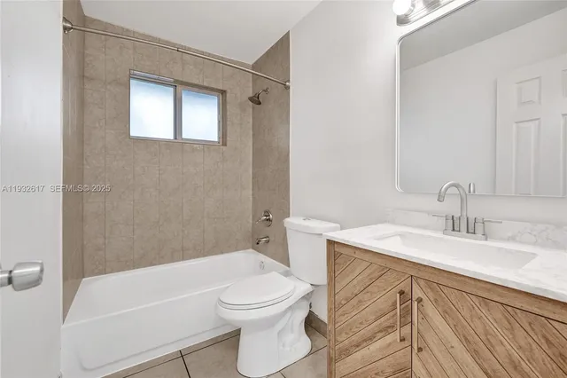 a kitchen with a sink and a stove