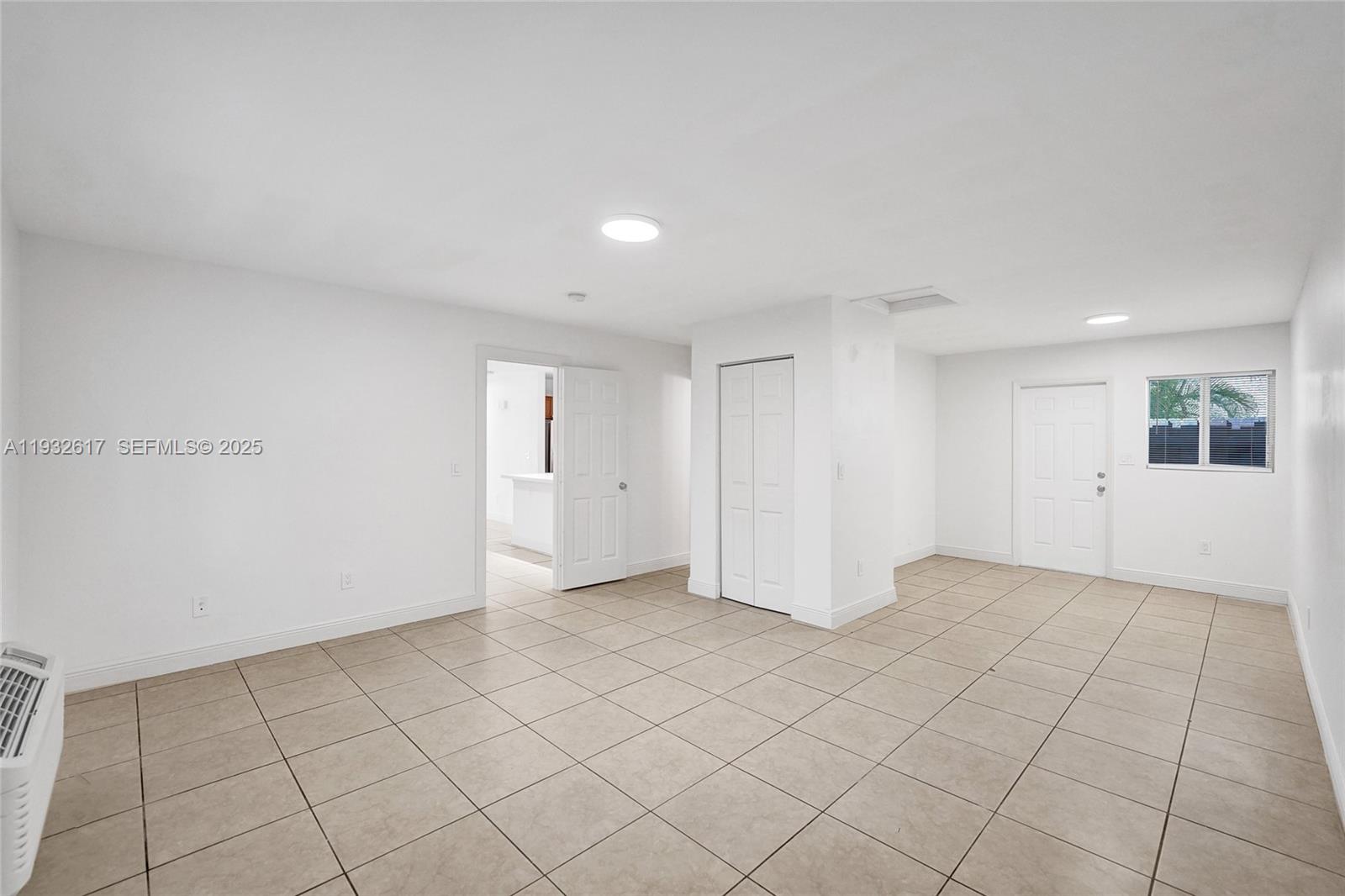 30 Southwest 8th Street, Unit 1 Hallandale Beach, FL 33009 - Photo 63 of 75 a view of an empty room and window