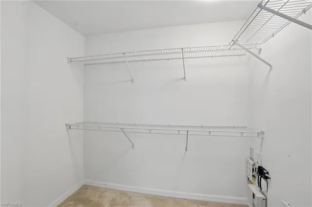a view of a room with racks on the wall