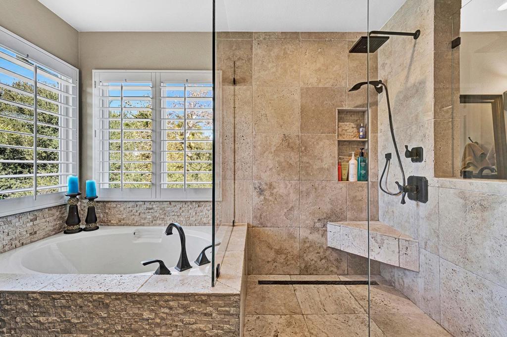 1463 Belmont Park Road Oceanside, CA 92057 - Photo 28 of 50 a bath tub sitting in a bathroom next to a window