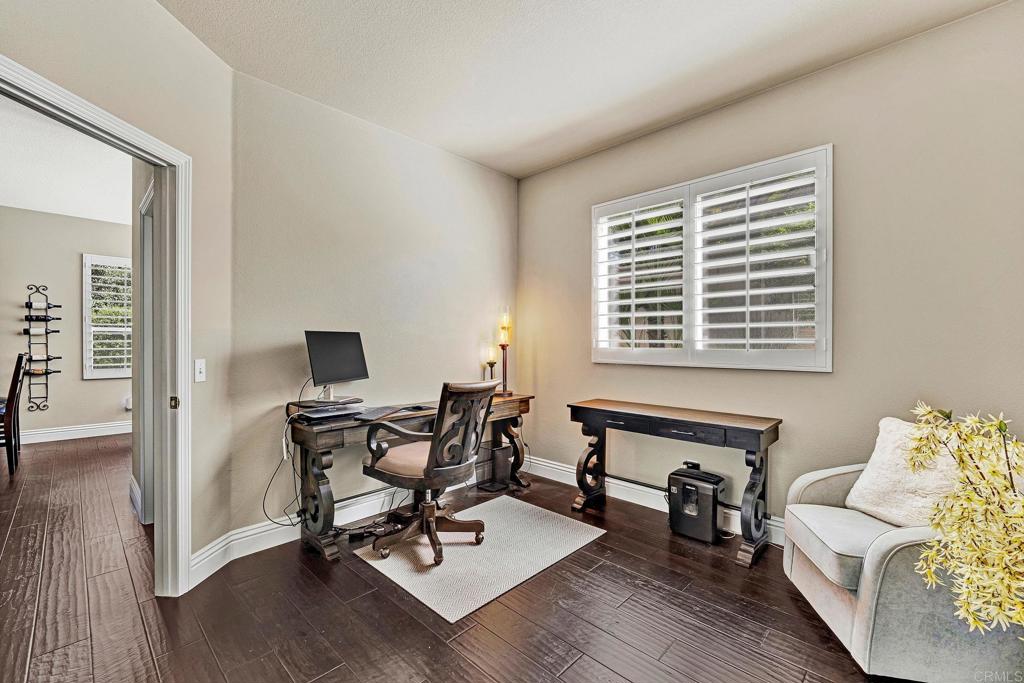 1463 Belmont Park Road Oceanside, CA 92057 - Photo 36 of 50 a view of a livingroom with workspace and a couch
