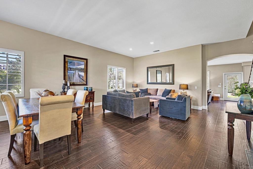 1463 Belmont Park Road Oceanside, CA 92057 - Photo 4 of 50 a living room with furniture and a table
