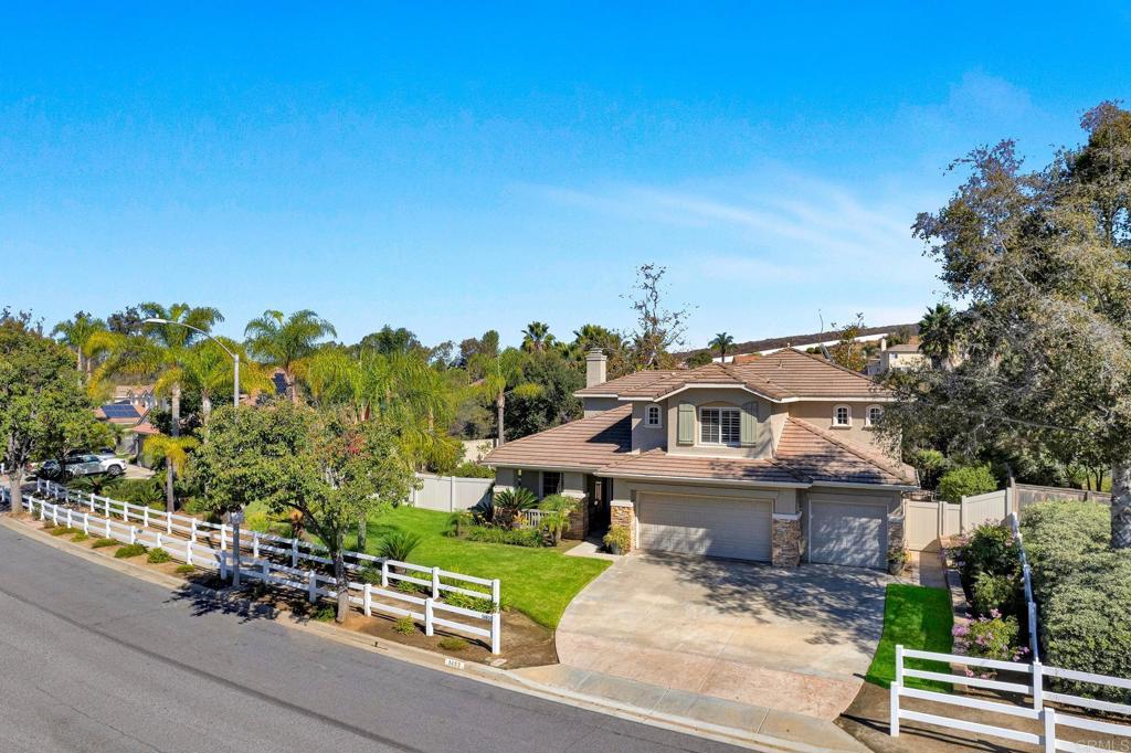1463 Belmont Park Road Oceanside, CA 92057 - Photo 45 of 50 an aerial view of a house with a yard
