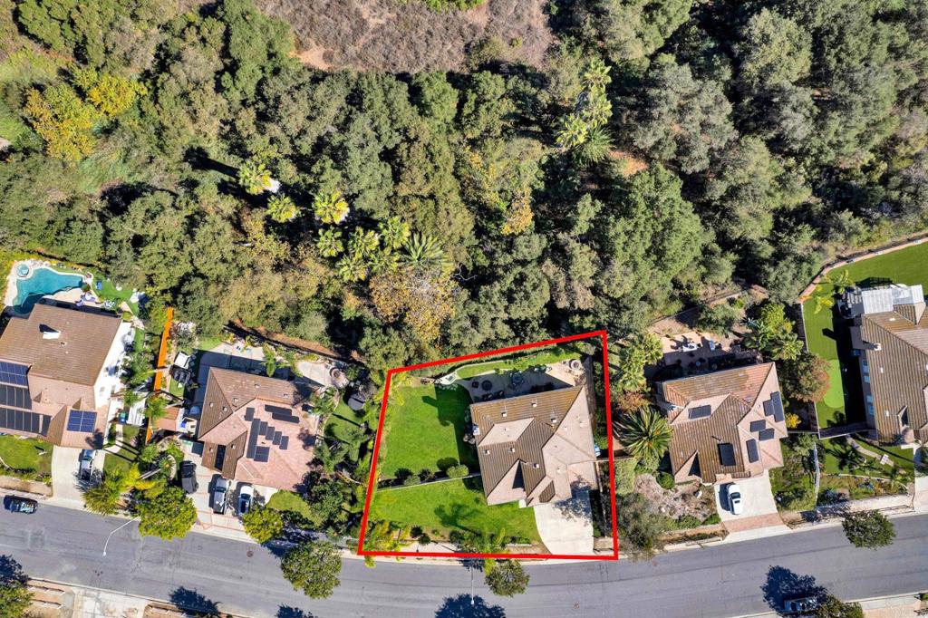 1463 Belmont Park Road Oceanside, CA 92057 - Photo 48 of 50 an aerial view of a houses with yard