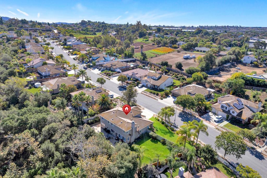 1463 Belmont Park Road Oceanside, CA 92057 - Photo 50 of 50 an aerial view of residential houses with outdoor space and trees