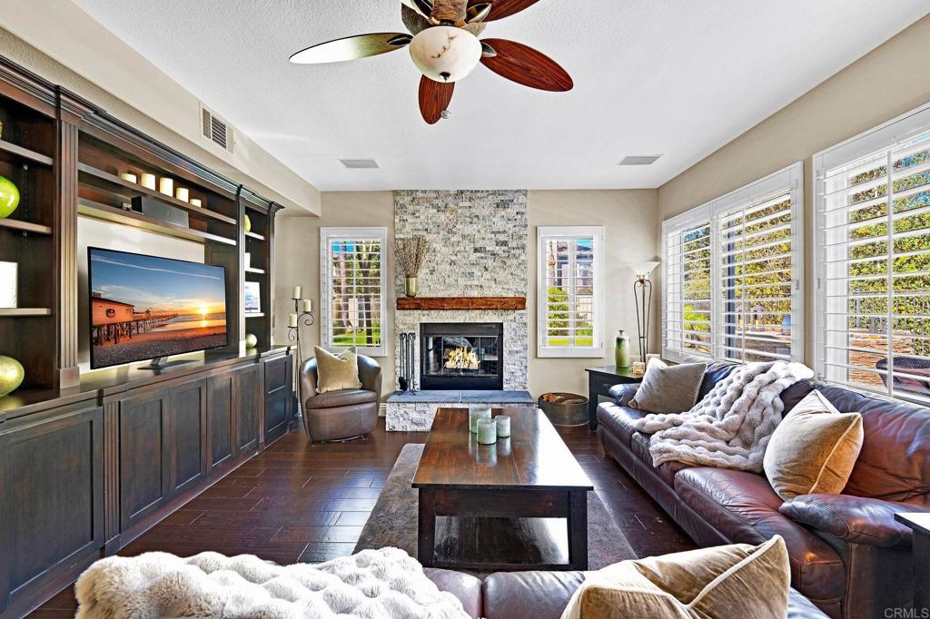 1463 Belmont Park Road Oceanside, CA 92057 - Photo 10 of 50 a living room with furniture and a flat screen tv