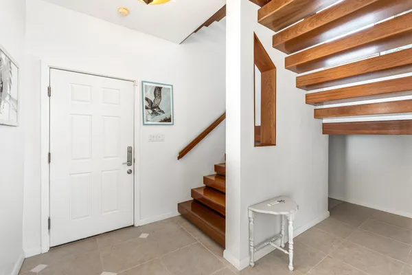a bedroom with a bed and cabinets