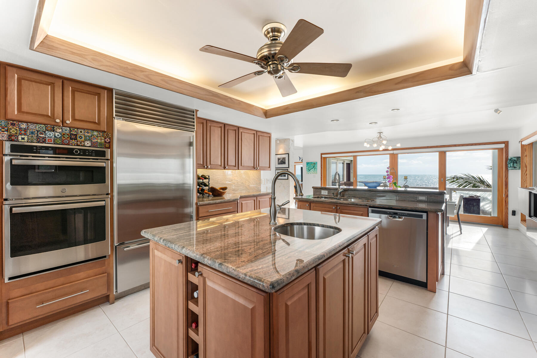 133 Sunset Drive Islamorada, FL 33036 - Photo 42 of 81 a kitchen with a stove sink and refrigerator