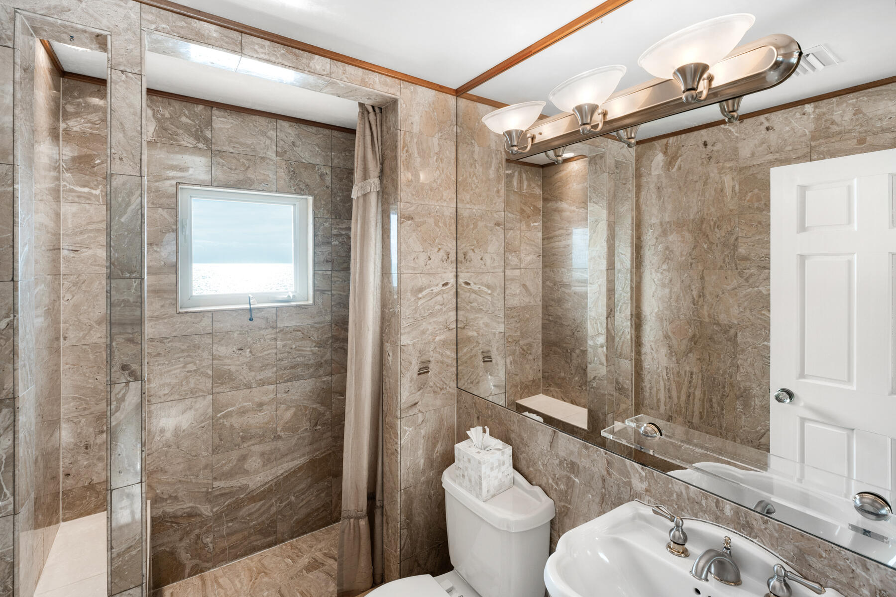 133 Sunset Drive Islamorada, FL 33036 - Photo 64 of 81 a bathroom with a granite countertop sink toilet and shower