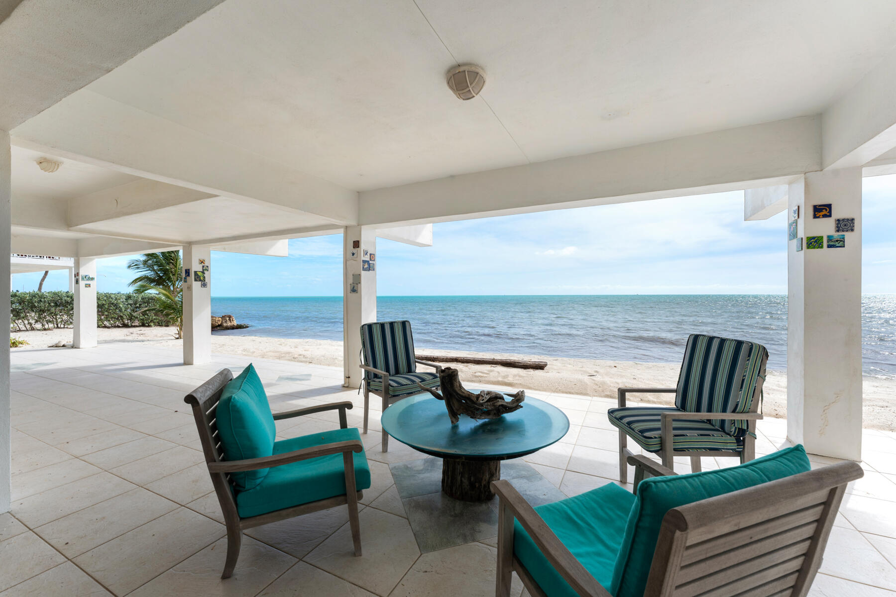 133 Sunset Drive Islamorada, FL 33036 - Photo 76 of 81 a living room with furniture and a floor to ceiling window