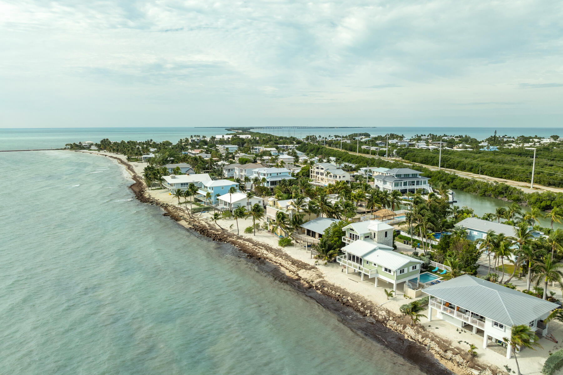133 Sunset Drive Islamorada, FL 33036 - Photo 79 of 81 an aerial view of residential houses with outdoor space and trees