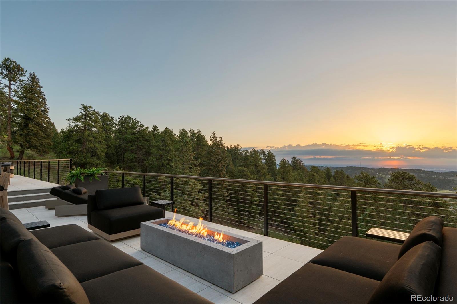 730 Genesee Mountain Road Golden, CO 80401 - Photo 44 of 50 a view of a roof deck with couches and sky view