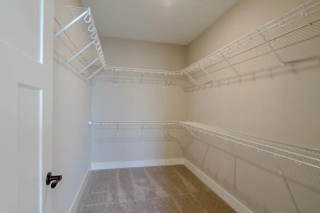 a view of a room with racks on the wall