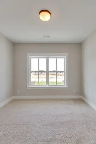 an empty room with a window