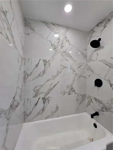 a bathroom with a bathtub