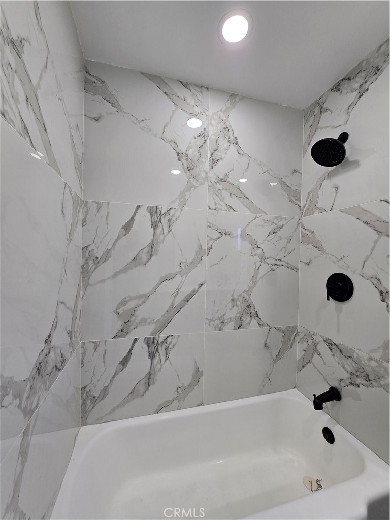 3404 Planz Road Bakersfield, CA 93309 - Photo 12 of 23 a bathroom with a bathtub