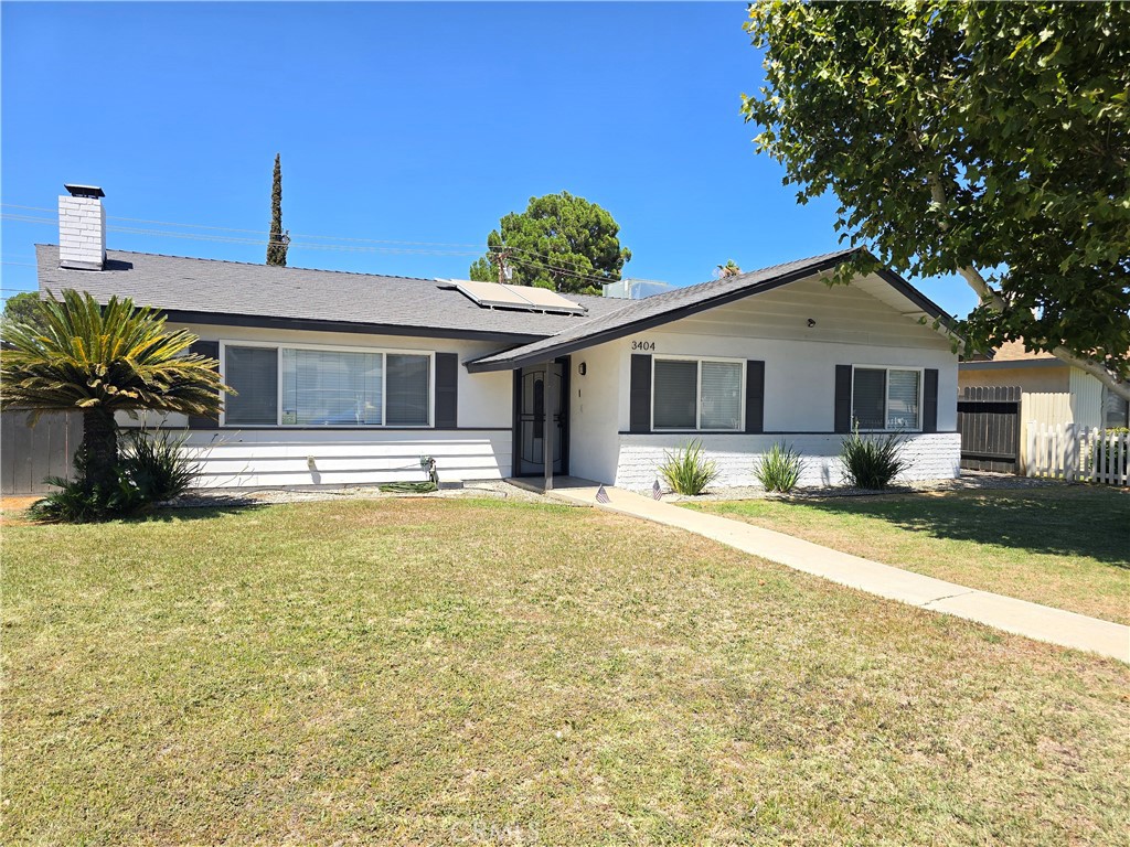3404 Planz Road Bakersfield, CA 93309 - Photo 2 of 23 a front view of house with yard