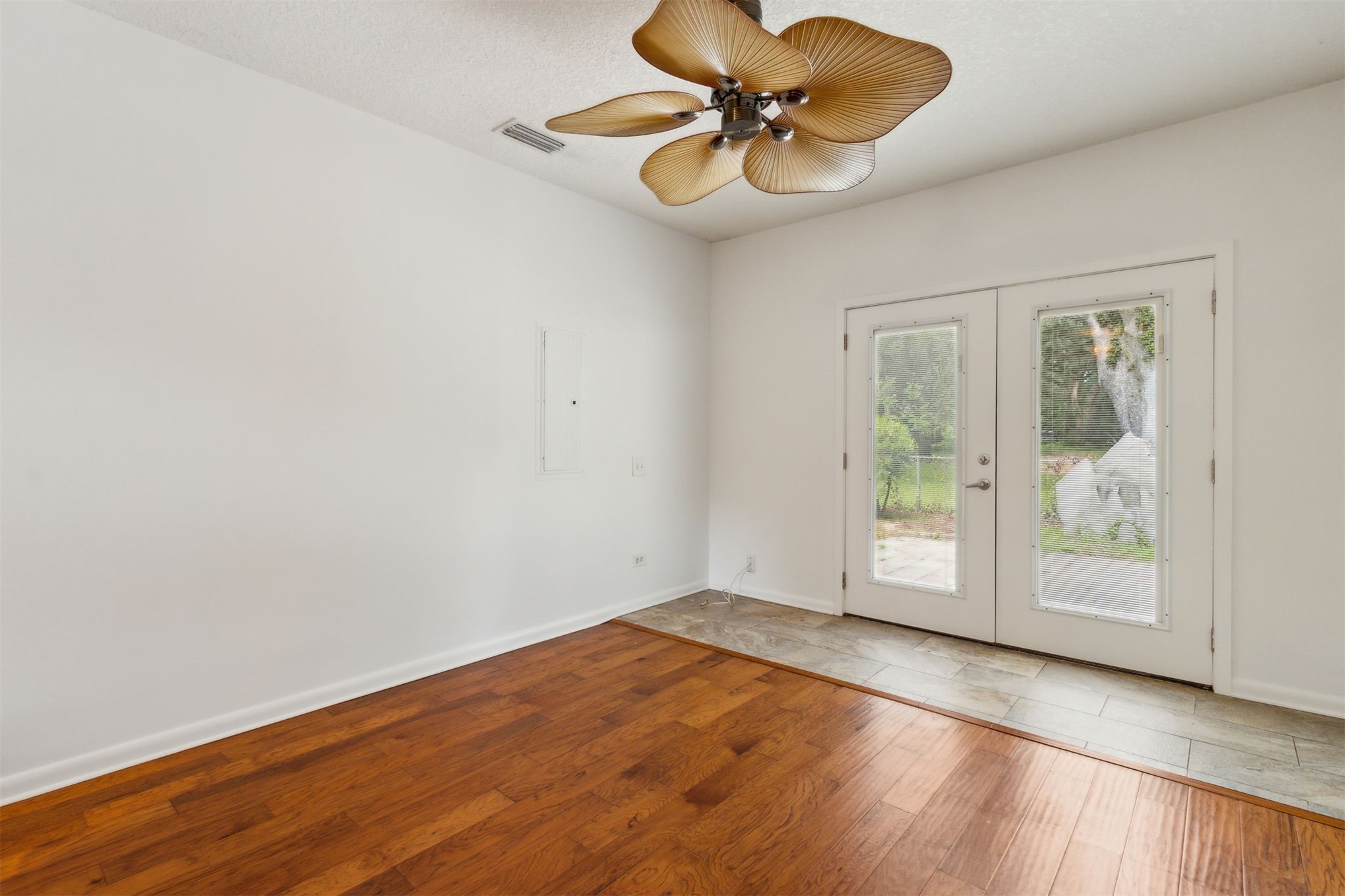 2441 Amelia Road Fernandina Beach, FL 32034 - Photo 24 of 36 wooden floor in an empty room with a window