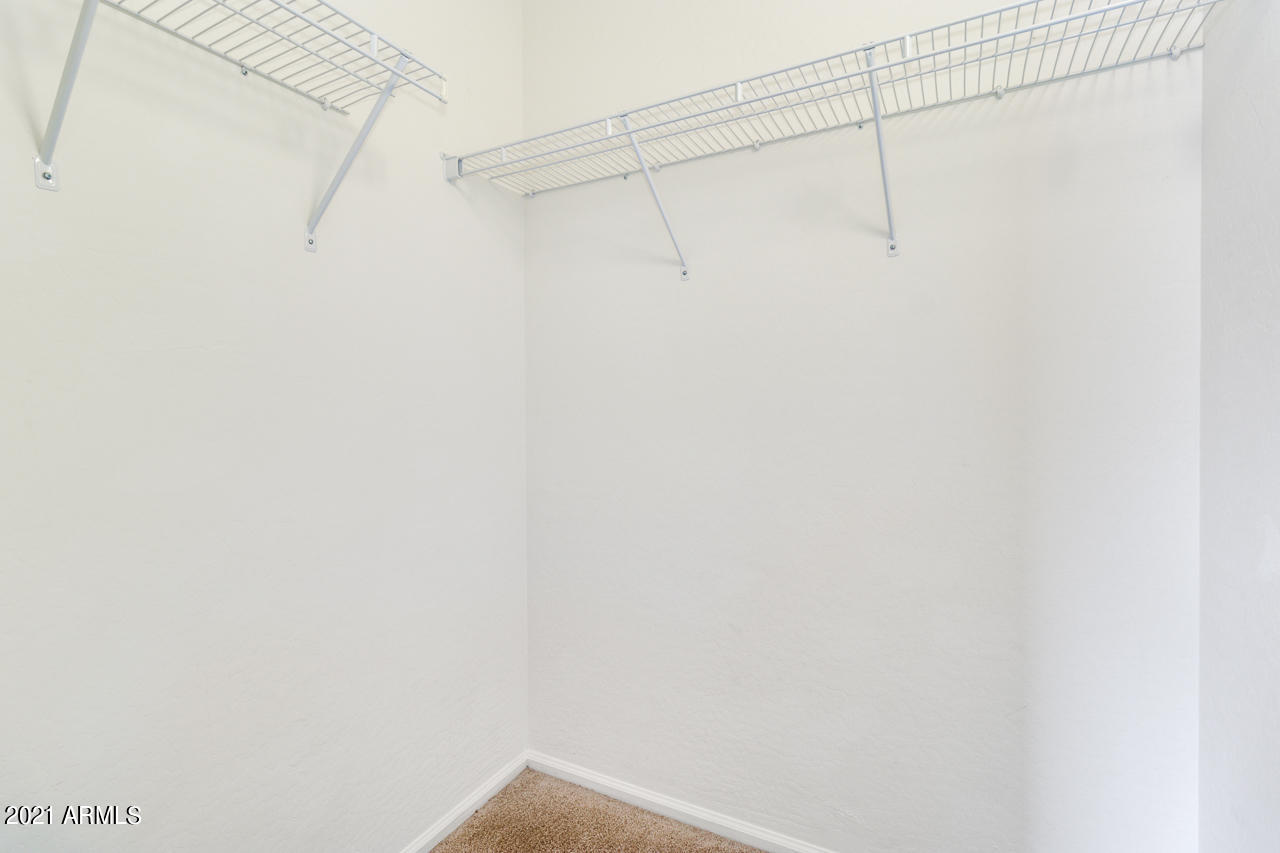 1074 South Hawk Lane Gilbert, AZ 85296 - Photo 26 of 35 a view of a rack on the wall