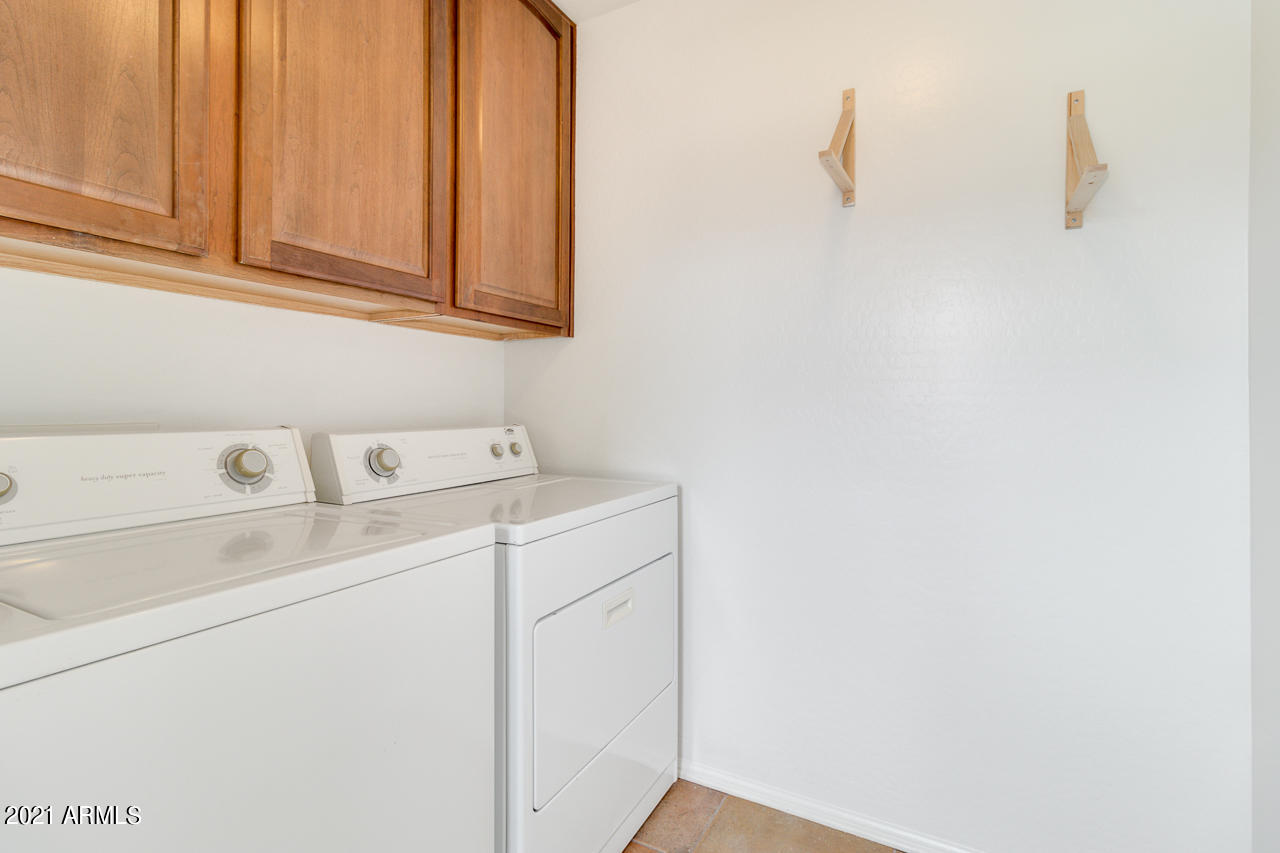 1074 South Hawk Lane Gilbert, AZ 85296 - Photo 27 of 35 a utility room with dryer and washer