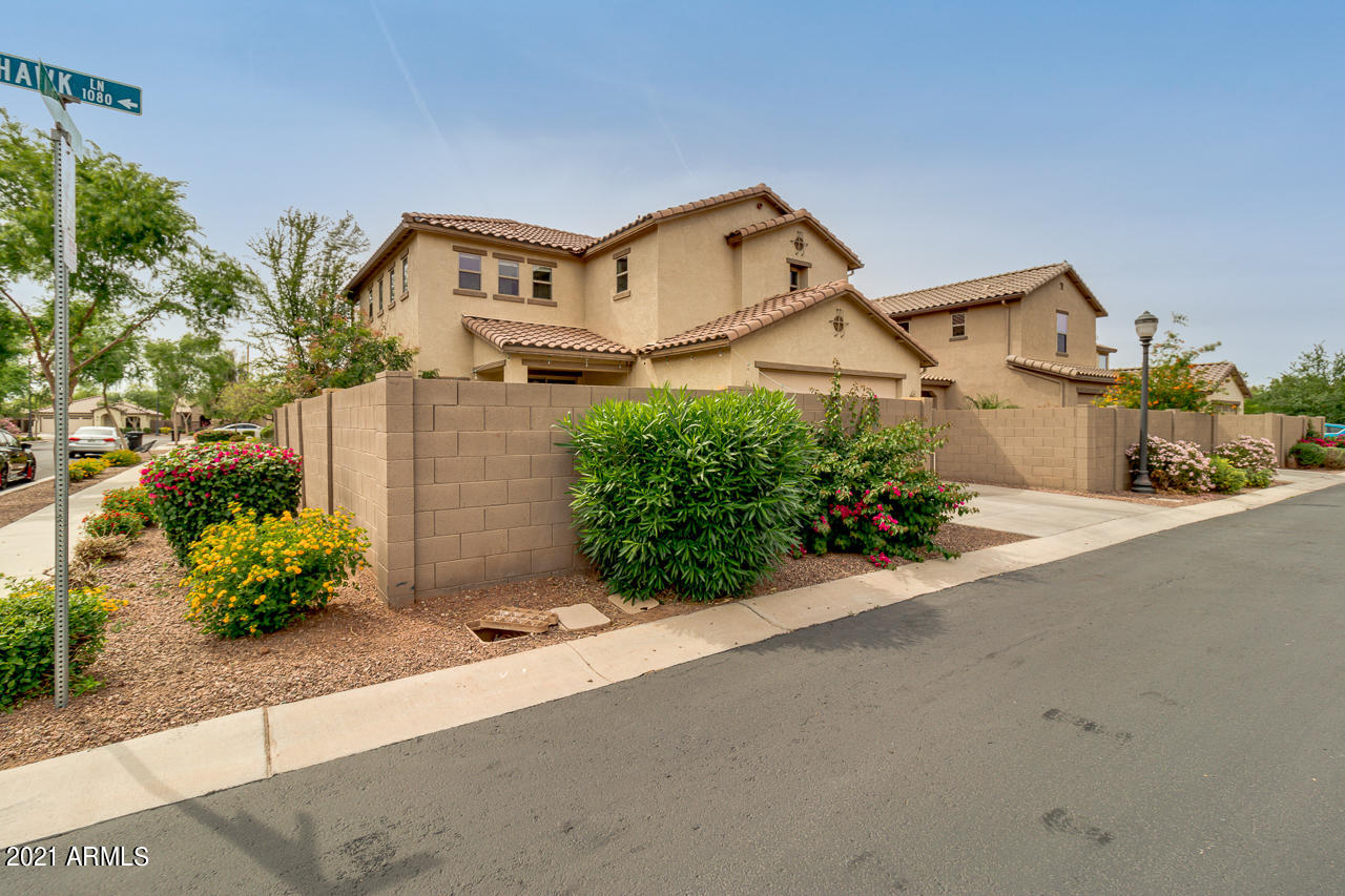 1074 South Hawk Lane Gilbert, AZ 85296 - Photo 34 of 35 front view of a house with a street