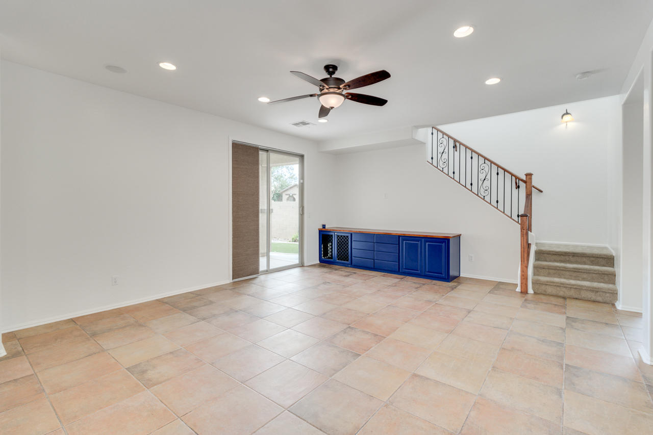 1074 South Hawk Lane Gilbert, AZ 85296 - Photo 7 of 35 a view of entryway and hall with a ceiling fan