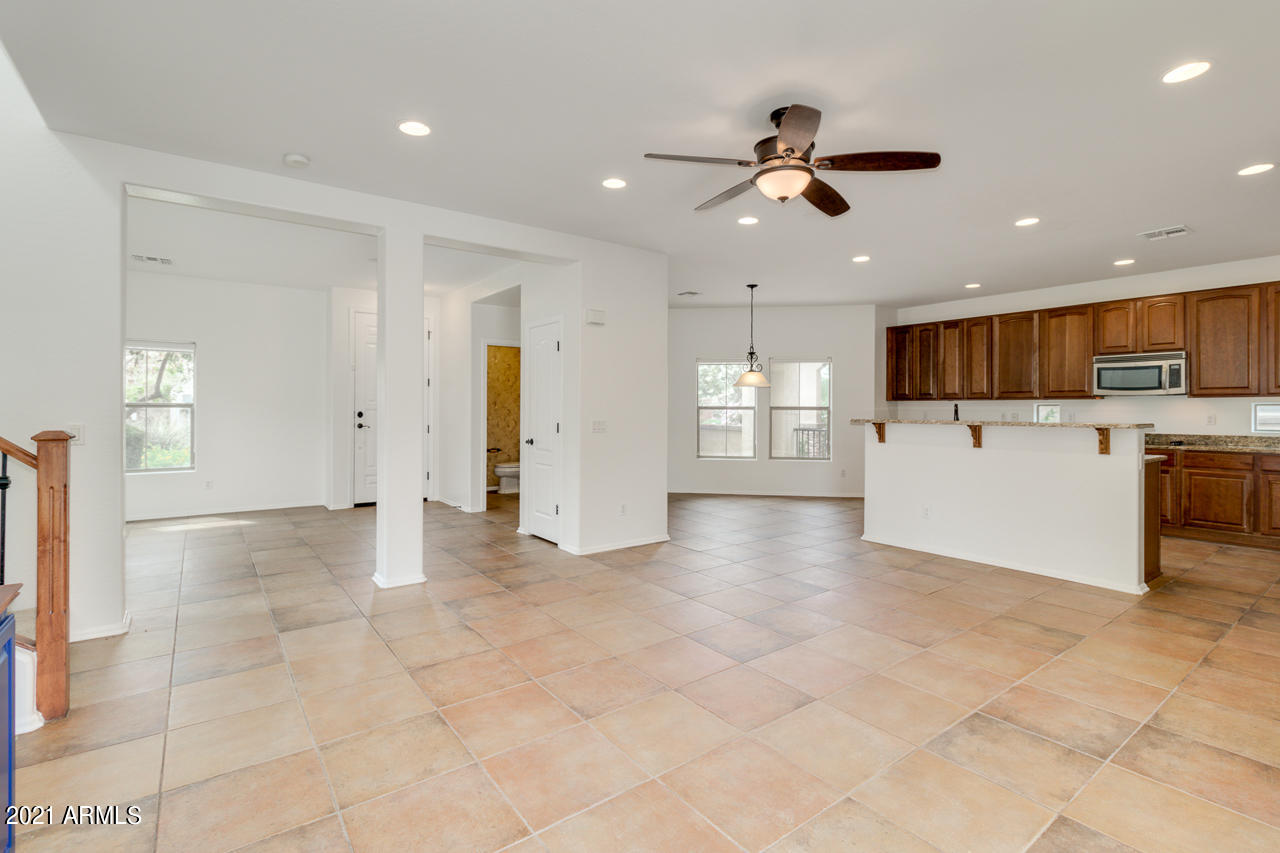 1074 South Hawk Lane Gilbert, AZ 85296 - Photo 9 of 35 a view of a kitchen with a sink and a window