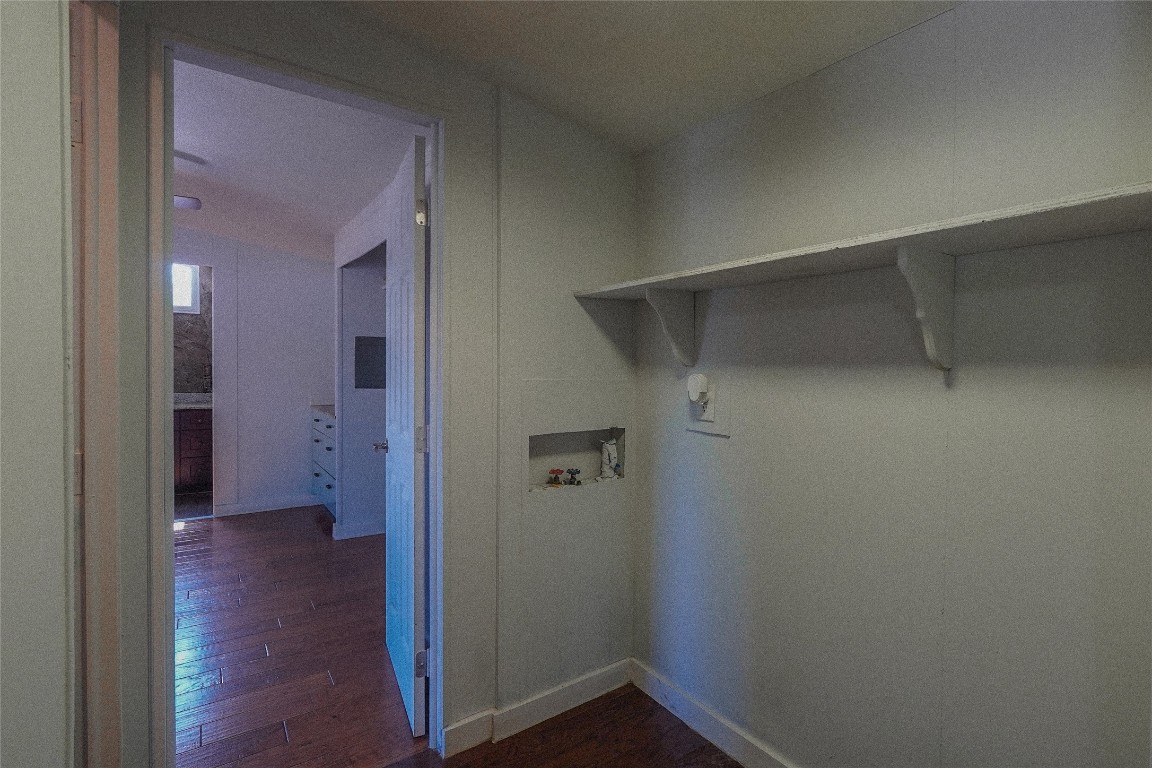 155 5th Street Maxwell, TX 78656 - Photo 18 of 34 a view of a hallway with wooden floor